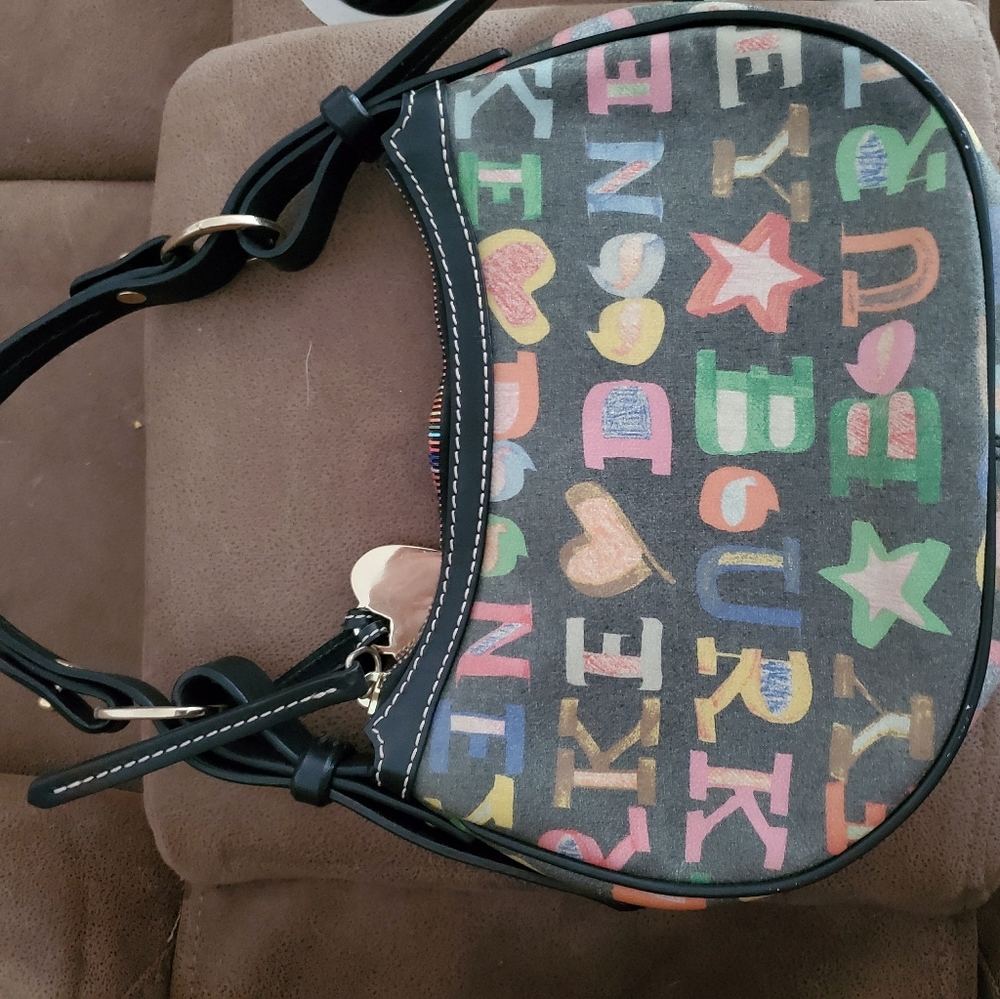 Dooney and bourke egg pouchette